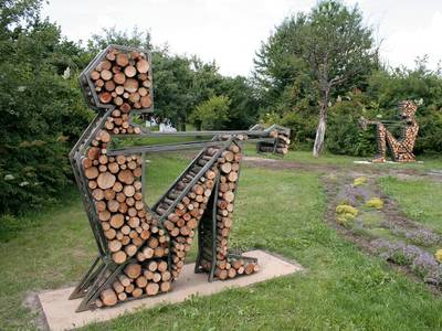 Sitting Figure Iron Wood sculpture by Jakub Flejšar — view 2